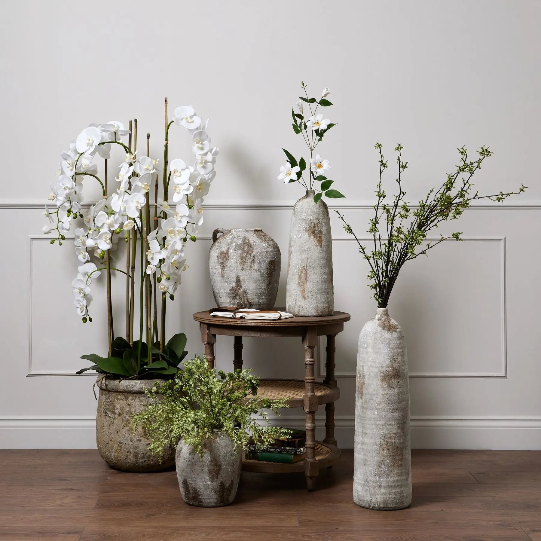 Large White Orchid In Antique Stone Pot Makur Interior